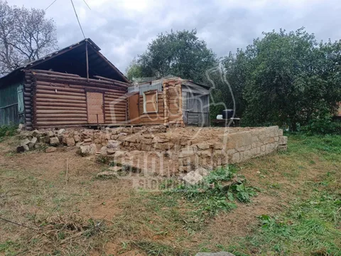 Фото после демонтажа части бревенчатого дома